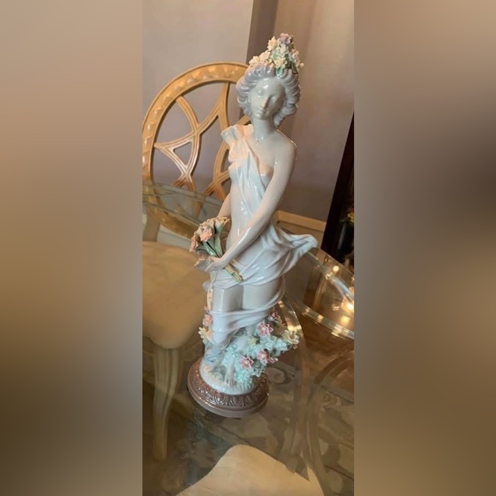 Elegant White Porcelain Figurine with Floral Accents